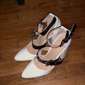 white and black buckle block heels